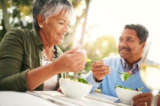 Older couple enjoying a healthy dinner Older couple enjoying a healthy dinner