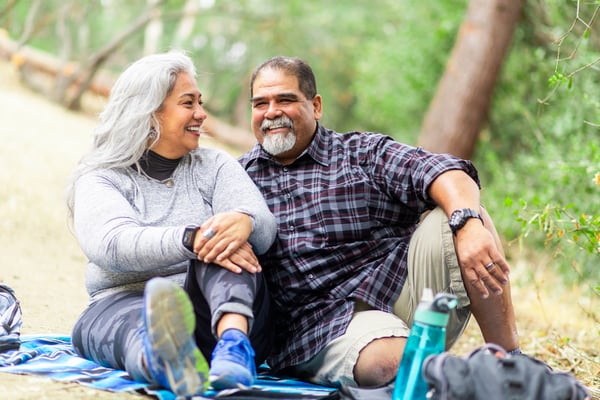 senior hispanic couple having a picnic
